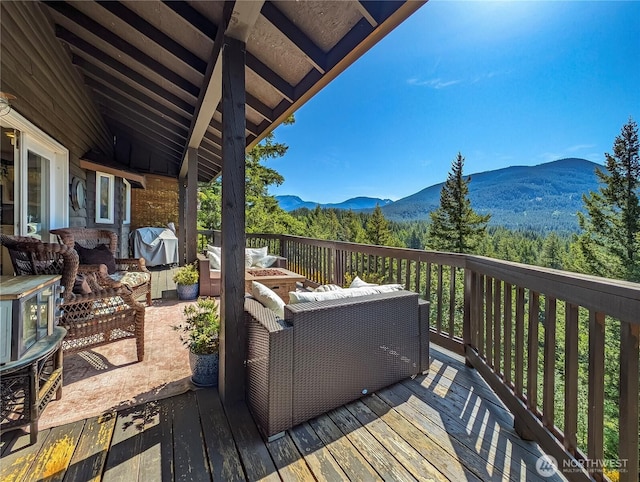 239 Alpine Dr, Packwood, WA 98361 - wooden deck featuring a mountain view, outdoor lounge area, and a grill