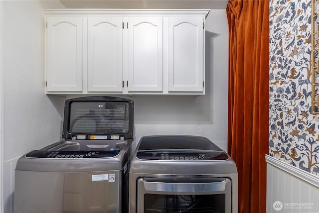 239 Alpine Dr, Packwood, WA 98361 - laundry room featuring washing machine and dryer and cabinet space