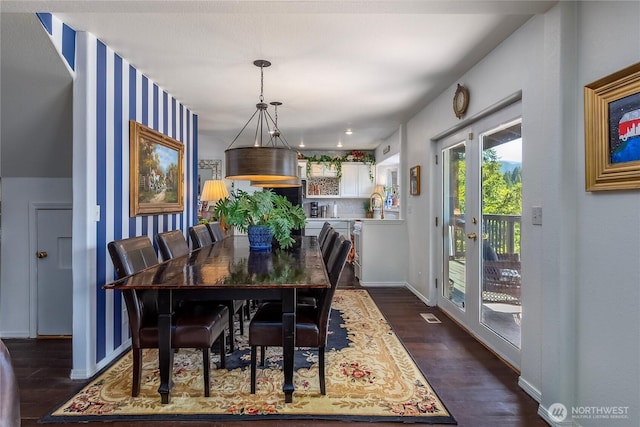 239 Alpine Dr, Packwood, WA 98361 - dining room with dark wood finished floors and baseboards