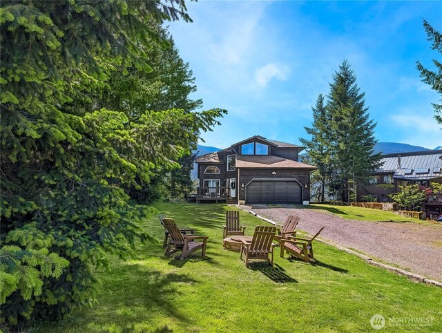 239 Alpine Dr, Packwood, WA 98361 - view of front of property with driveway and a front yard