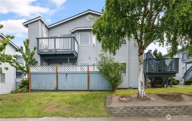 730 SE 8th Ave Unit B101, Oak Harbor, WA 98277 - view of front of home featuring an outdoor fire pit, stairs, and a wooden deck