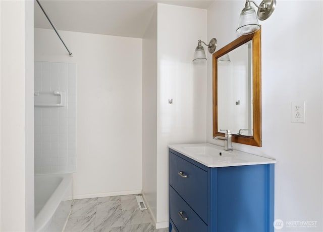 1020 SW Bowmer St, Oak Harbor, WA 98277 - full bathroom featuring vanity, marble look tile flooring, and shower / tub combination