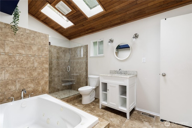 1020 SW Bowmer St, Oak Harbor, WA 98277 - bathroom featuring a skylight, wooden ceiling, toilet, a whirlpool tub, and vanity