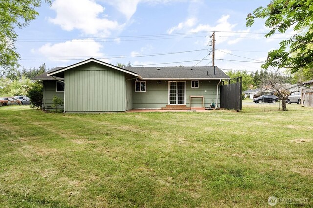 1020 SW Bowmer St, Oak Harbor, WA 98277 - back of house featuring a lawn, a patio area, and entry steps
