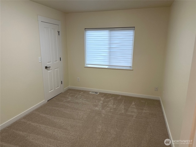 9614 191st Street Ct E, Puyallup, WA 98375 - carpeted empty room with baseboards