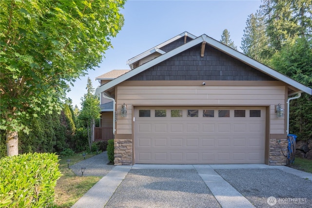 725 N 198th St, Shoreline, WA 98133 - view of front of house featuring stone siding and concrete driveway