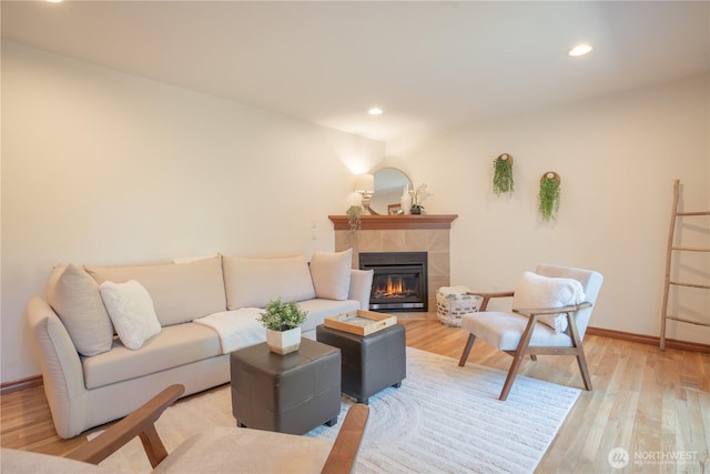 725 N 198th St, Shoreline, WA 98133 - living area with light wood-type flooring, a fireplace, baseboards, and recessed lighting