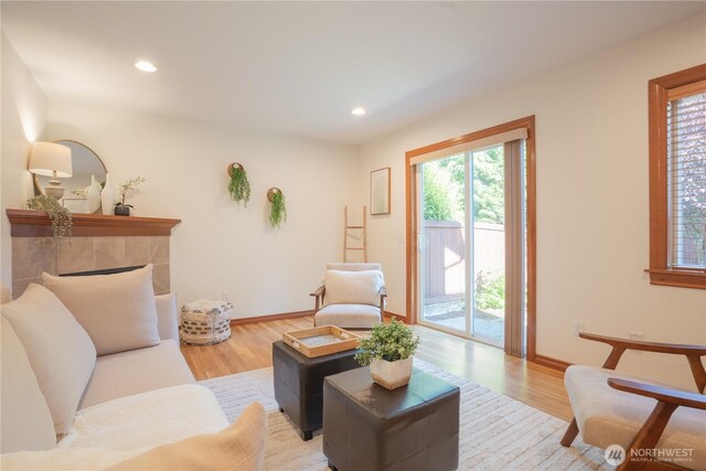 725 N 198th St, Shoreline, WA 98133 - living room featuring wood finished floors, baseboards, and recessed lighting