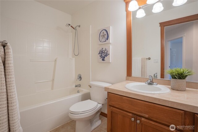725 N 198th St, Shoreline, WA 98133 - full bathroom featuring toilet, vanity, shower / washtub combination, and tile patterned flooring