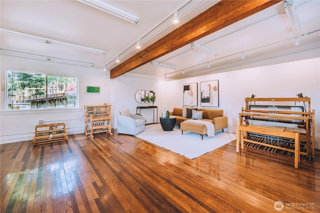 9202 3rd Ave NW, Seattle, WA 98117 - living room featuring rail lighting, hardwood / wood-style floors, and beam ceiling