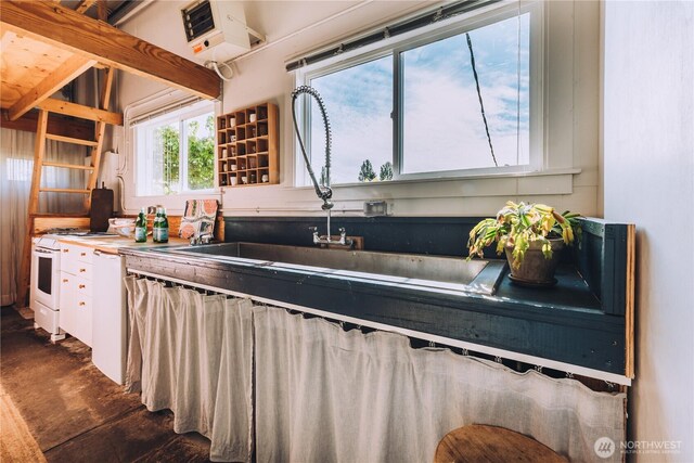 9202 3rd Ave NW, Seattle, WA 98117 - kitchen with white cabinetry, white gas range oven, a sink, and open shelves