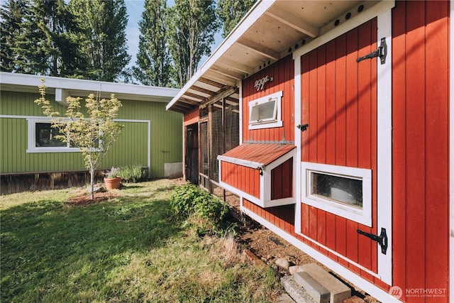 9202 3rd Ave NW, Seattle, WA 98117 - view of property exterior with a yard and exterior structure