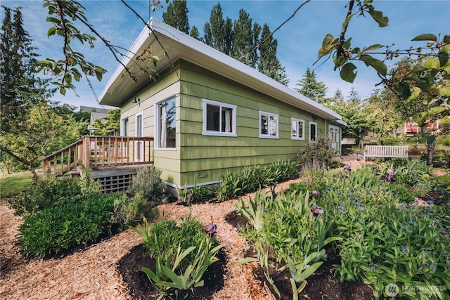 9202 3rd Ave NW, Seattle, WA 98117 - view of property exterior with a wooden deck