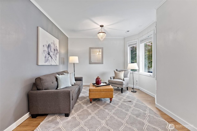 22718 1st Pl W, Bothell, WA 98021 - living room featuring ornamental molding, light wood-type flooring, and baseboards