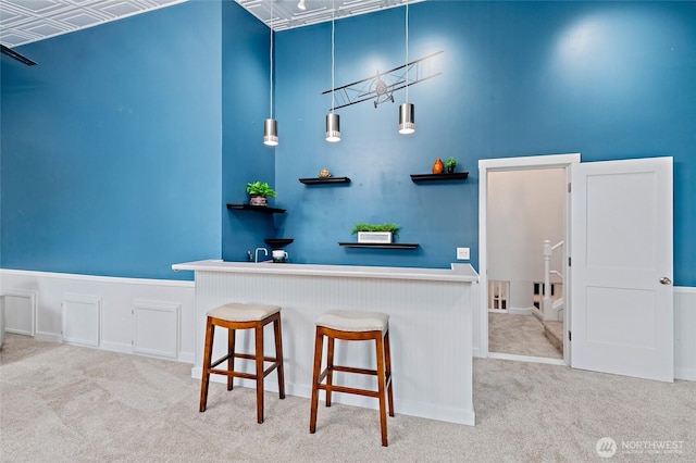 22718 1st Pl W, Bothell, WA 98021 - bar area with wainscoting and carpet flooring