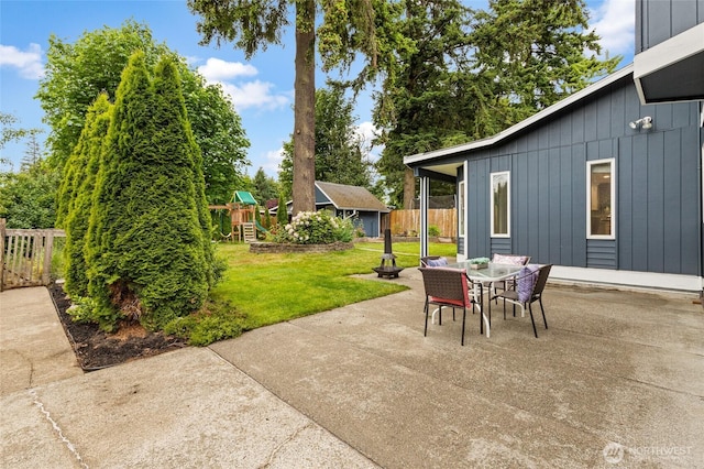 22718 1st Pl W, Bothell, WA 98021 - view of patio / terrace featuring a playground and outdoor dining space