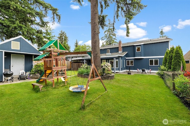 22718 1st Pl W, Bothell, WA 98021 - rear view of property featuring a playground, a patio, and a chimney
