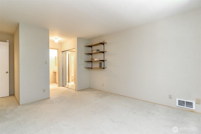 1526 Alki Ave SW Unit 303, Seattle, WA 98116 - empty room with light colored carpet