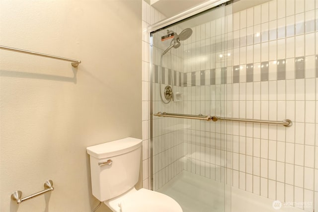 1526 Alki Ave SW Unit 303, Seattle, WA 98116 - bathroom with toilet and a tile shower