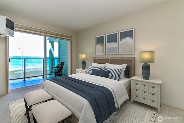 1526 Alki Ave SW Unit 303, Seattle, WA 98116 - bedroom featuring access to outside, light colored carpet, a wall mounted AC, and baseboards