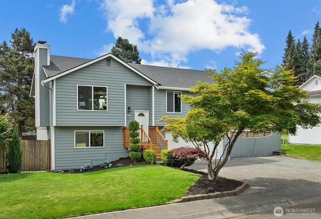 11620 28th St NE, Lake Stevens, WA 98258 - raised ranch with a chimney, roof with shingles, and driveway