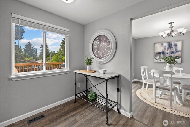 11620 28th St NE, Lake Stevens, WA 98258 - dining room featuring wood finished floors and a chandelier