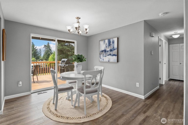 11620 28th St NE, Lake Stevens, WA 98258 - dining room featuring a chandelier and wood finished floors