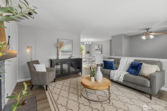 11620 28th St NE, Lake Stevens, WA 98258 - living area with wood finished floors, a chandelier, and ceiling fan