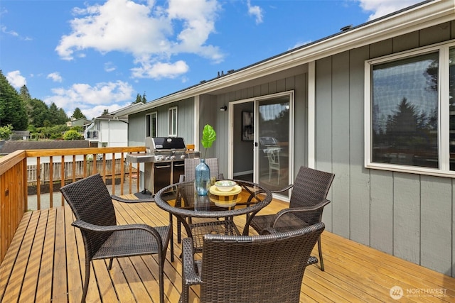 11620 28th St NE, Lake Stevens, WA 98258 - wooden terrace with a grill and outdoor dining space