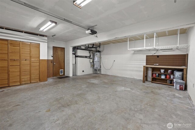 11620 28th St NE, Lake Stevens, WA 98258 - garage with water heater and a garage door opener