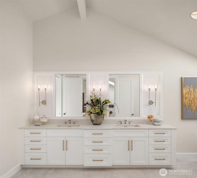 8620 N Mercer Way, Mercer Island, WA 98040 - bathroom featuring high vaulted ceiling, double vanity, baseboards, and beam ceiling