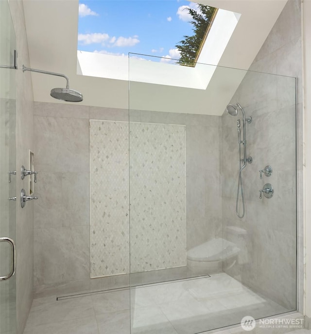 8620 N Mercer Way, Mercer Island, WA 98040 - full bathroom with a stall shower, a skylight, and toilet