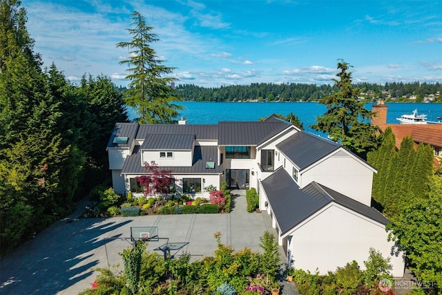 8620 N Mercer Way, Mercer Island, WA 98040 - view from above of property featuring a nearby body of water and a heavily wooded area