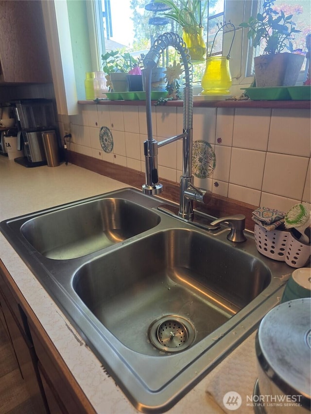208 N Broadway St, Westport, WA 98595 - kitchen view of tasteful backsplash and a sink