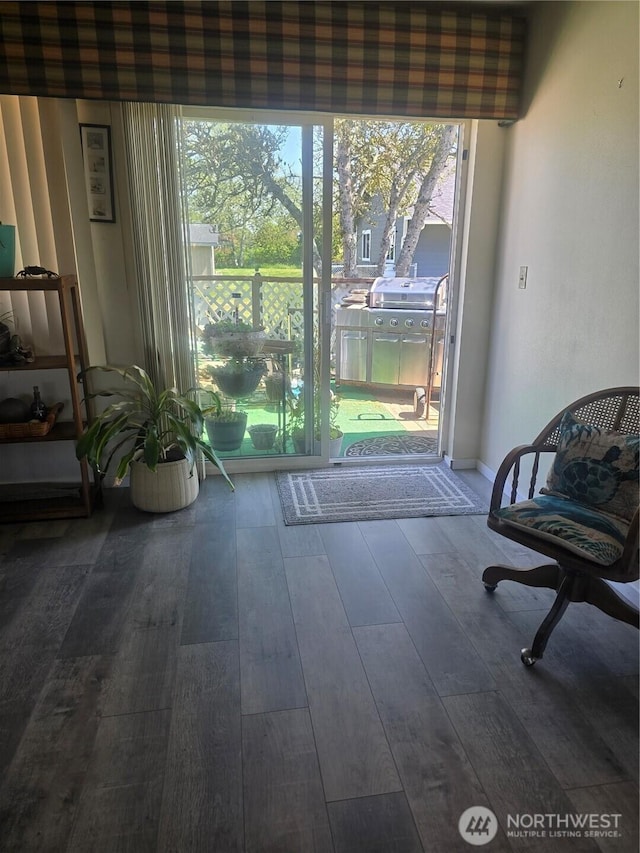208 N Broadway St, Westport, WA 98595 - living area with hardwood / wood-style flooring and healthy amount of natural light