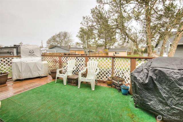 208 N Broadway St, Westport, WA 98595 - view of grassy yard featuring a wooden deck