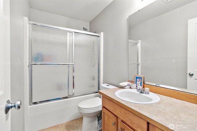 6499 Francis Loop SE, Auburn, WA 98092 - full bathroom with vanity, toilet, and bath / shower combo with glass door