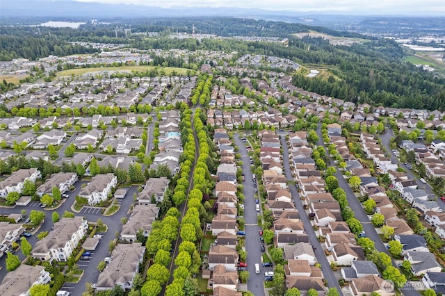 6499 Francis Loop SE, Auburn, WA 98092 - aerial overview of property's location with nearby suburban area and a heavily wooded area