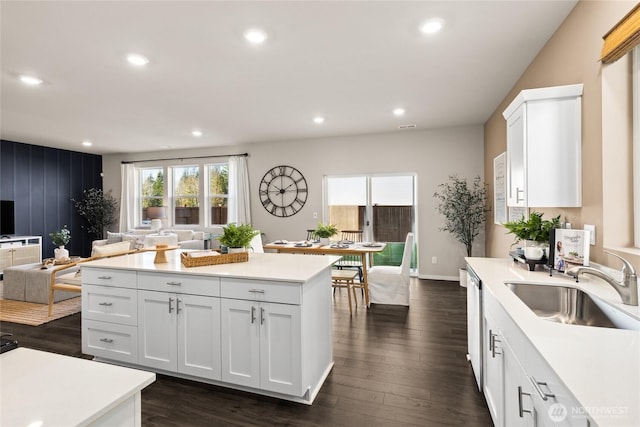 3904 23rd Ave NE Unit 39, Olympia, WA 98506 - kitchen with a sink, light countertops, recessed lighting, dark wood finished floors, and open floor plan