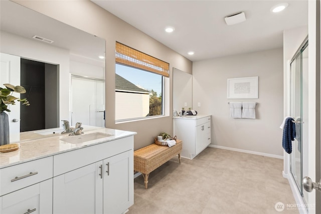 3904 23rd Ave NE Unit 39, Olympia, WA 98506 - bathroom featuring a shower stall, vanity, recessed lighting, and baseboards
