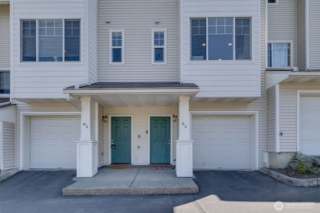 2300 Benson Rd S Unit D3, Renton, WA 98055 - property entrance with an attached garage and driveway