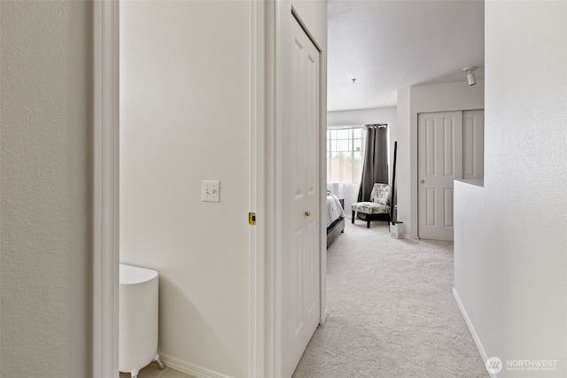 2300 Benson Rd S Unit D3, Renton, WA 98055 - corridor with light colored carpet and baseboards