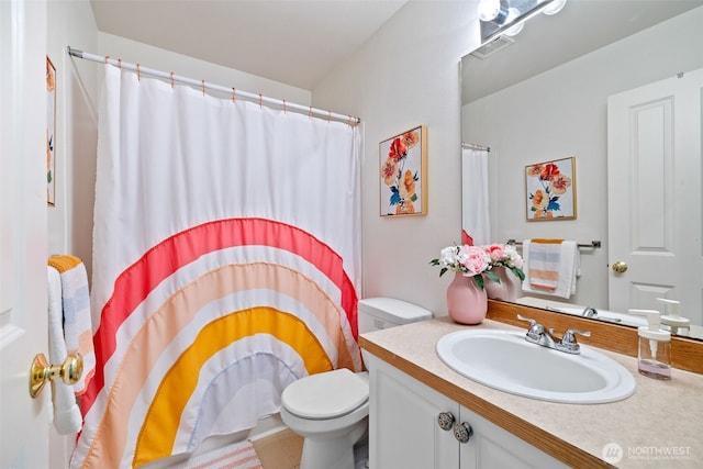2300 Benson Rd S Unit D3, Renton, WA 98055 - bathroom featuring vanity, toilet, a shower with shower curtain, and tile patterned flooring