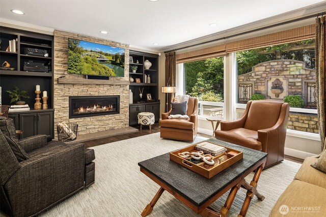 21505 30th Ave SE, Bothell, WA 98021 - living room featuring a fireplace, ornamental molding, wood finished floors, and recessed lighting