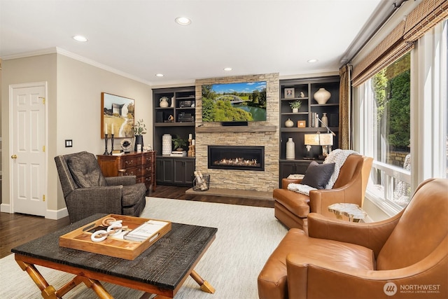 21505 30th Ave SE, Bothell, WA 98021 - living area with a fireplace, dark wood-type flooring, crown molding, recessed lighting, and baseboards