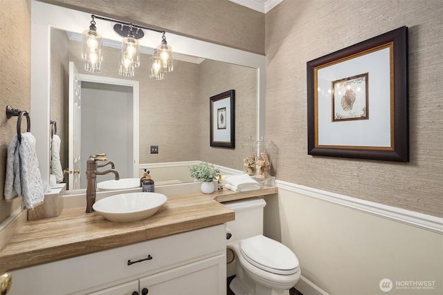 21505 30th Ave SE, Bothell, WA 98021 - bathroom featuring vanity, toilet, and ornamental molding