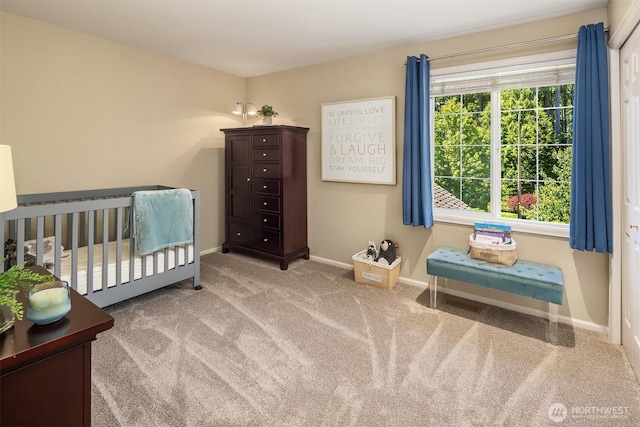 21505 30th Ave SE, Bothell, WA 98021 - carpeted bedroom with baseboards and a nursery area