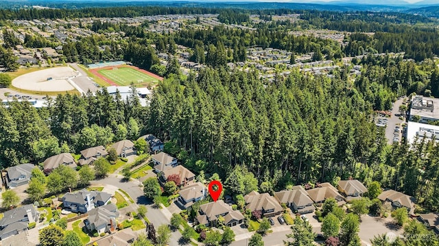 21505 30th Ave SE, Bothell, WA 98021 - aerial view of property and surrounding area featuring a heavily wooded area and nearby suburban area