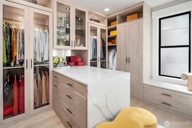 17281 SE 43rd St, Bellevue, WA 98006 - walk in closet featuring light wood finished floors