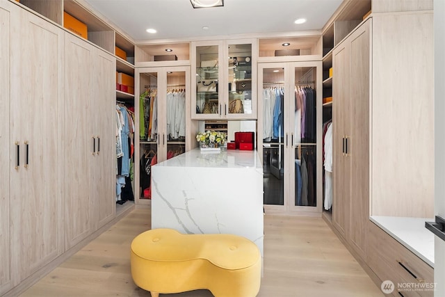 17281 SE 43rd St, Bellevue, WA 98006 - walk in closet with light wood-style floors